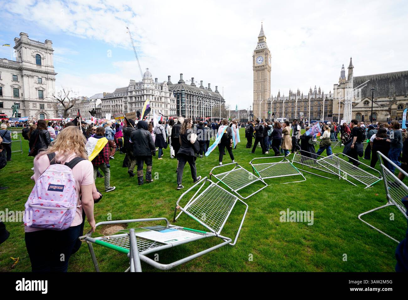 Campaigners take part in a rally organised by trans rights groups ...
