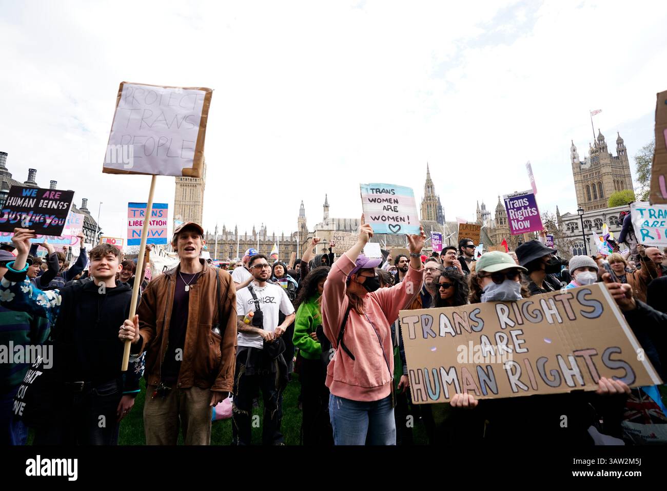 Campaigners take part in a rally organised by trans rights groups ...