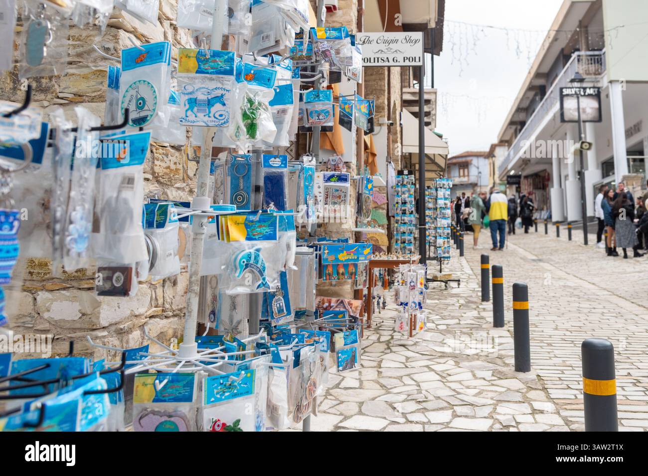 Lefkara, Cyprus, April 5, 2025: Tourists walking at lefkara traditional village in cyprus, with souvenir shops displaying local products Stock Photo