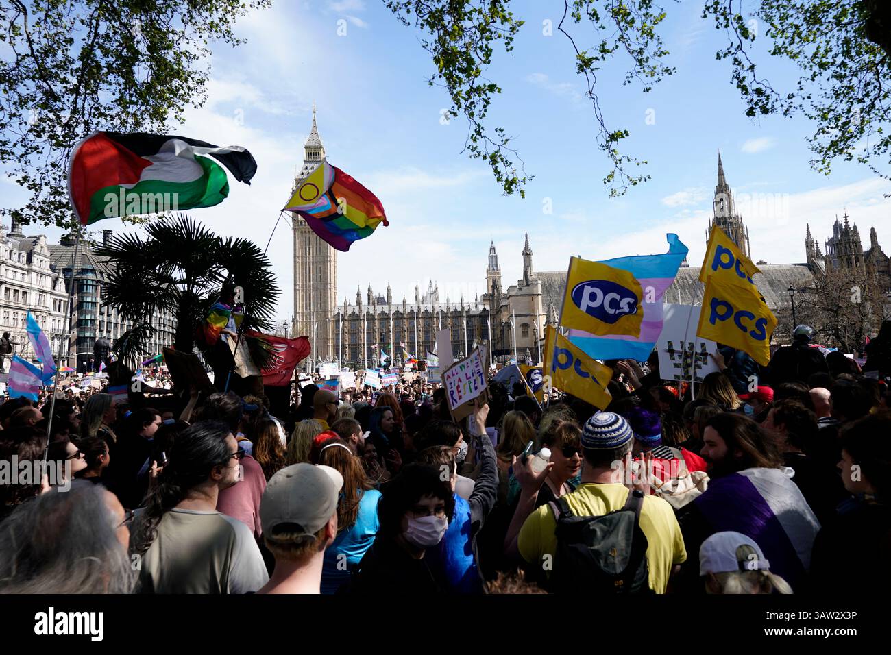 Campaigners take part in a rally organised by trans rights groups ...