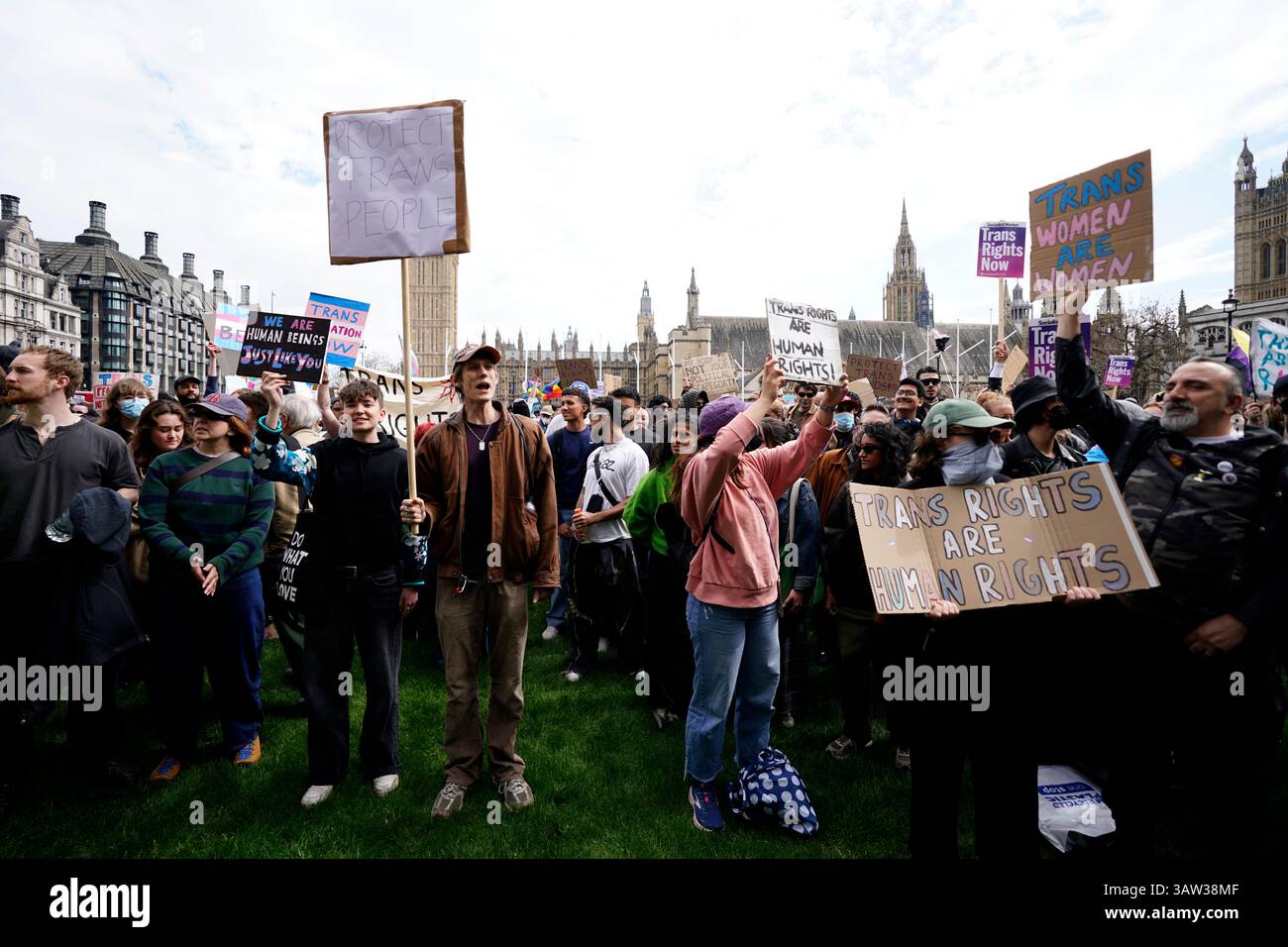Campaigners take part in a rally organised by trans rights groups ...