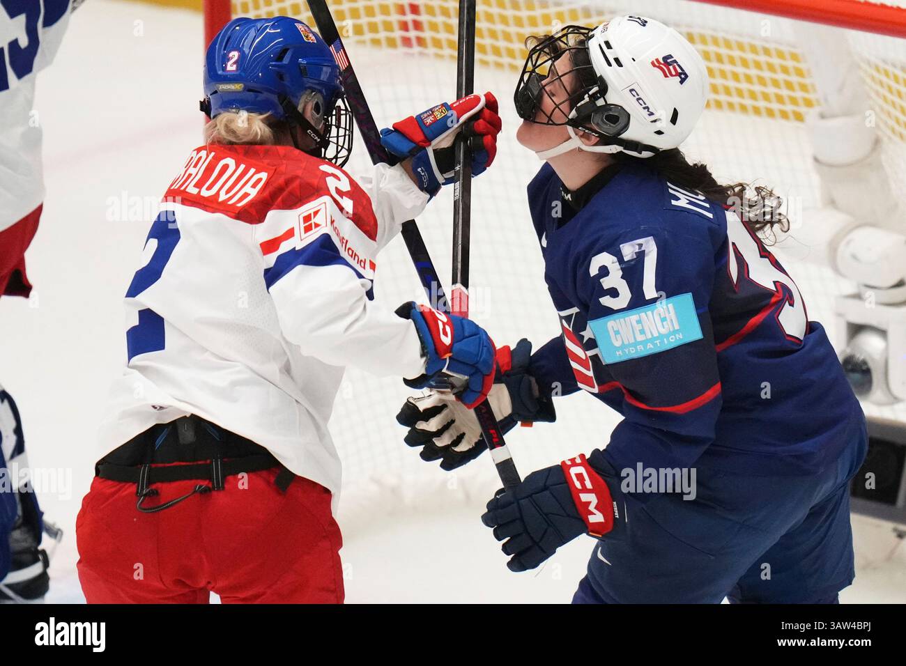 Aneta Tejralova of Czech Republic, left, checks United States' Abbey ...