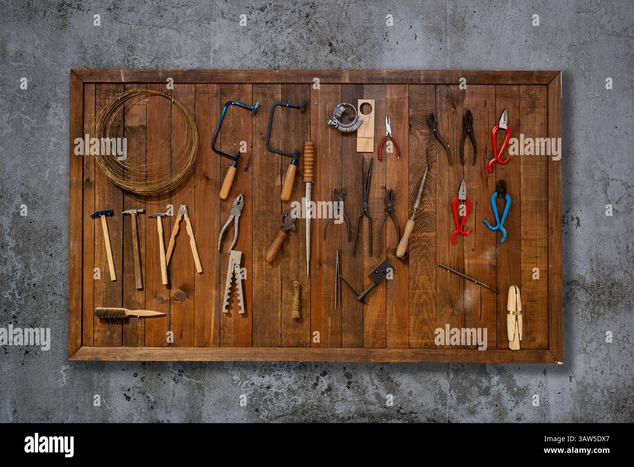 Tools on wall hanging at a carpentry workshop. High quality photo Stock Photo