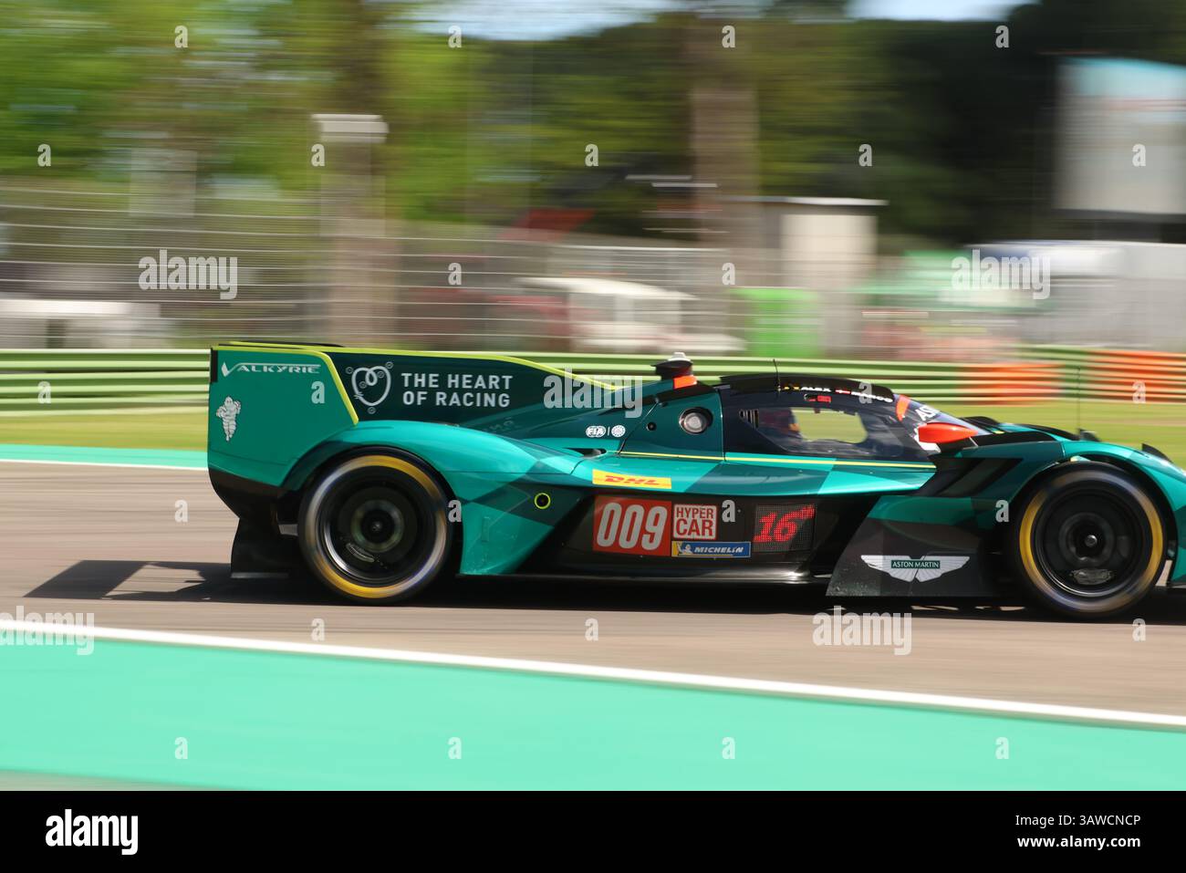 Imola, Italy. 19th Apr, 2025. The #009 Heart of Racing Aston Martin Valkyrie AMR-LMH Hypercar speeds through the Variante Alta chicane during the FIA World Endurance Championship, WEC 6 Hours Of Imola 2025, Italy (Photo by Wan Mikhail Roslan/Sipa USA) Credit: Sipa USA/Alamy Live News Stock Photo