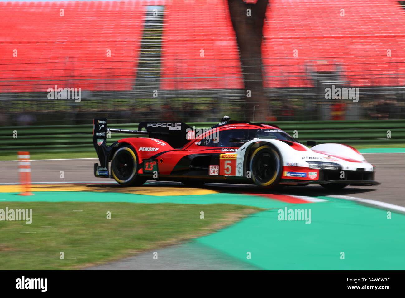 The #5 Porsche 963 of Porsche Penske Motorsport navigates through the ...