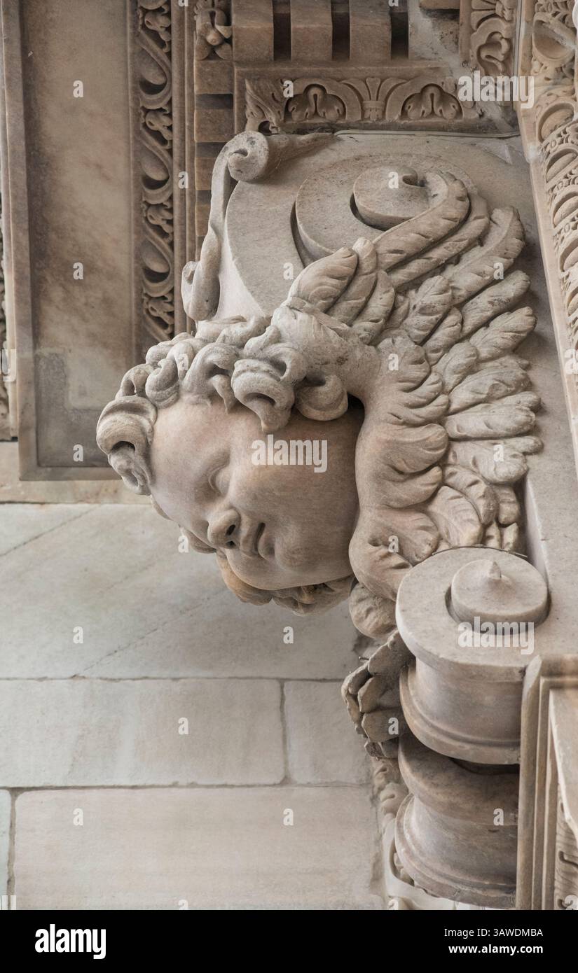 Stone carved corbel depicting a cherub, part of the intricate ...