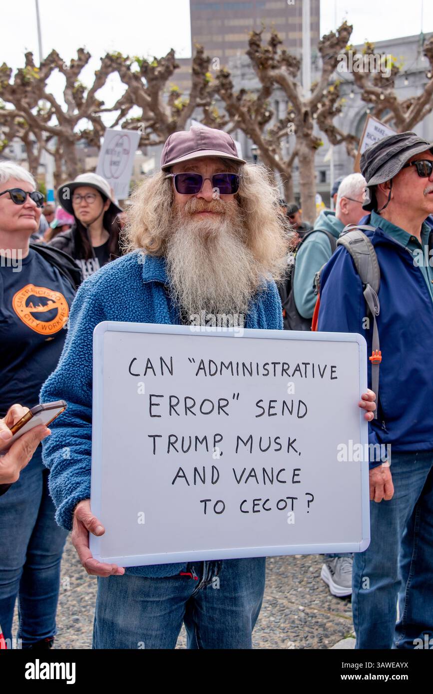 San Francisco, USA. 19th Apr 2025. A man holds a sign reading, 'Can 'Administrative error' send Trump, Musk, and Vance to CECOT?' at the Civic Center Plaza “Stop the Billionaire Agenda” protest against the Trump Administration.    Credit: Shelly Rivoli/Alamy Live News - Stock Image