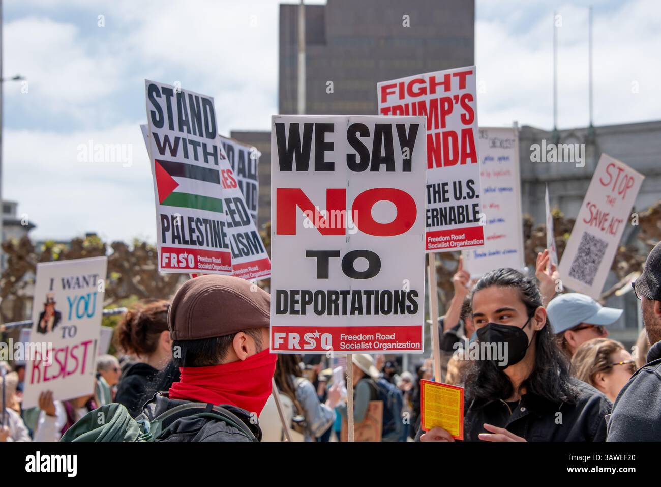 San Francisco, USA. 19th Apr 2025. Protesters fill Civic Center Plaza. for the 'Stop the Billionaire Agenda” protest against the Trump Administration. At the center, a protest sign reads, 'We say no to deportations.' Credit: Shelly Rivoli/Alamy Live News - Stock Image