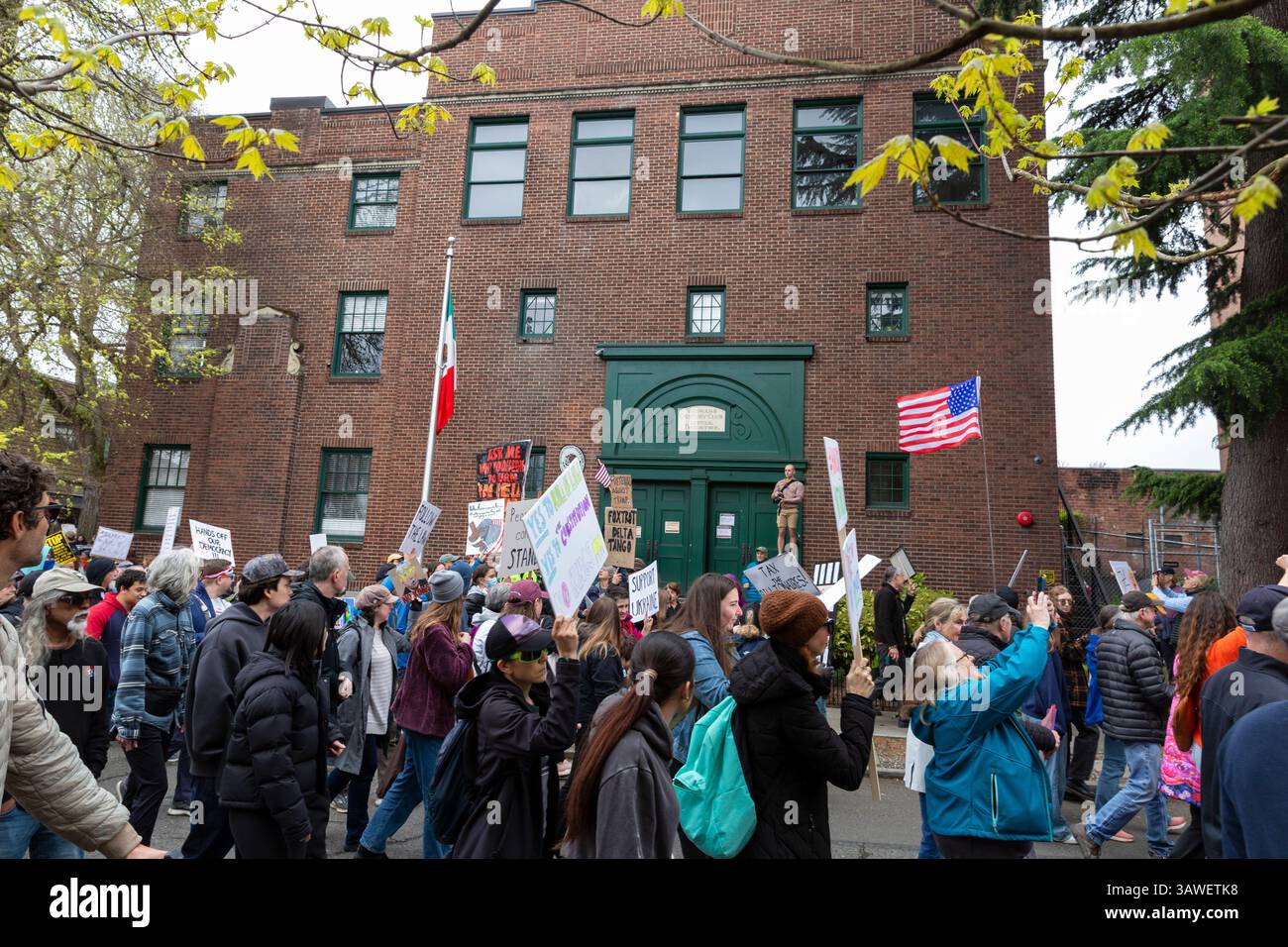 Seattle, Washington, USA. 19th April 2025. Hundreds of protesters and supporters gather at the Mexican Consulate in Seattle’s Capitol Hill neighborhood during the 'We the People Means Everyone' rally and march in Seattle on Saturday, April 19, 2025. The demonstration in support of democracy, diversity and equity is part of a national day of action against actions of the Trump administration. Credit: Paul Christian Gordon/Alamy Live News Stock Photo