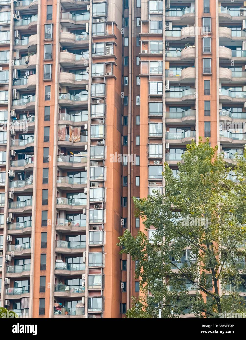 Modern residential building showcasing balconies and air conditioning ... - Residential Unit Balconies Included In Building Area