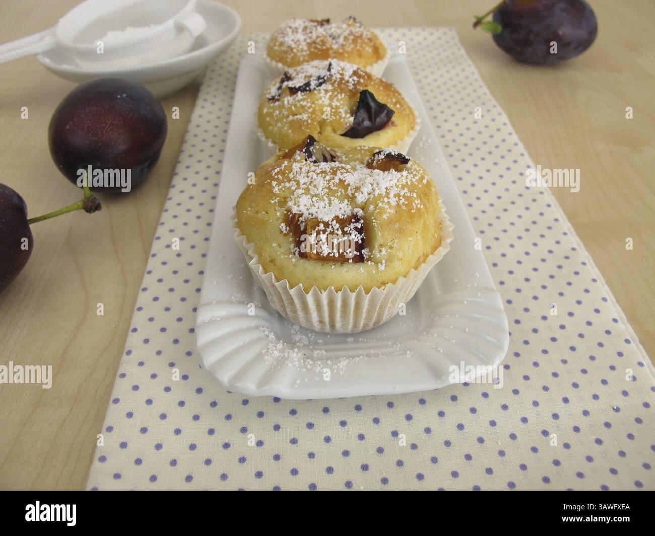 Friands with plums Stock Photo - Alamy