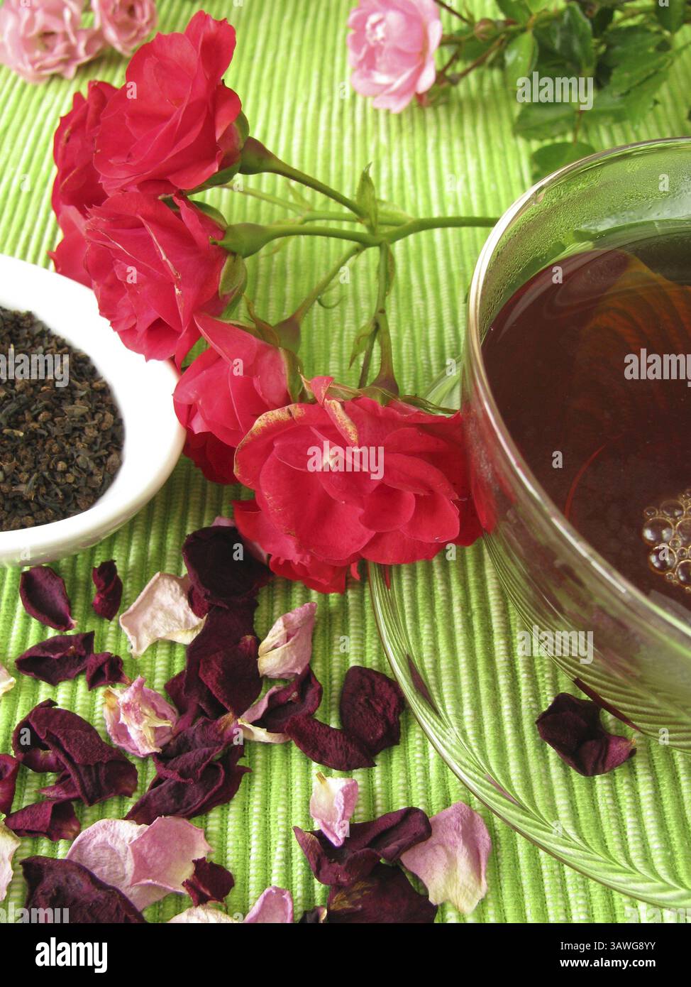 Black tea with rose petals Stock Photo - Alamy