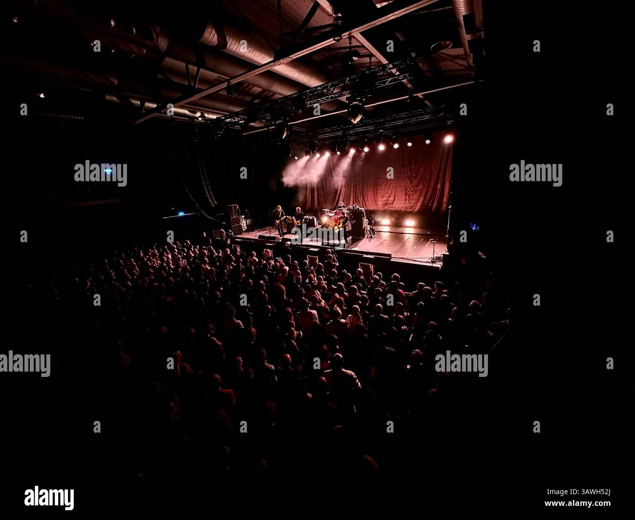 The German band Tocotronic in concert at the Columbiahalle venue in Berlin, Germany - Smartphone Captured Stock Image