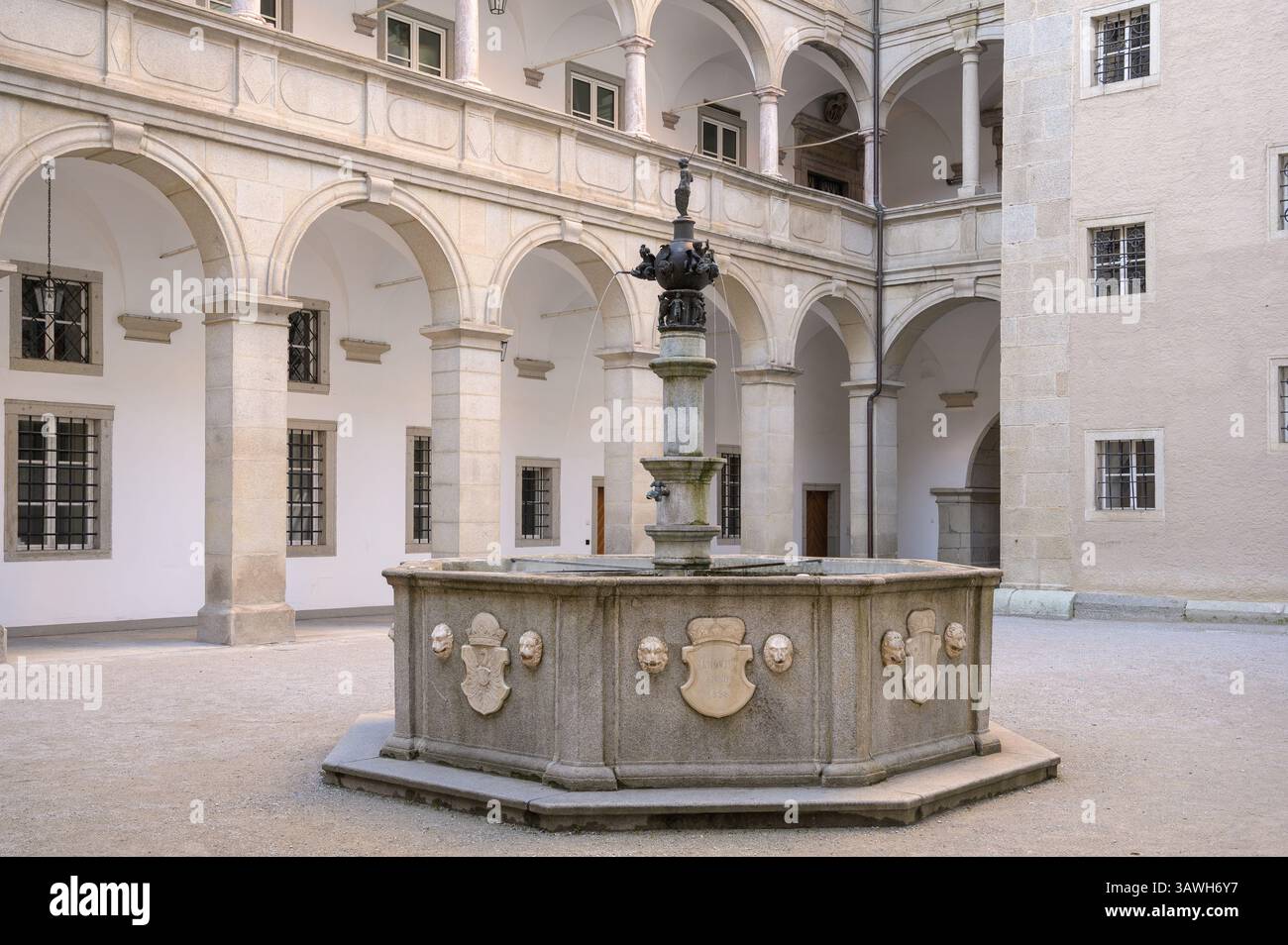 A beautiful fountain stands in the center of the Landhaus courtyard in ...