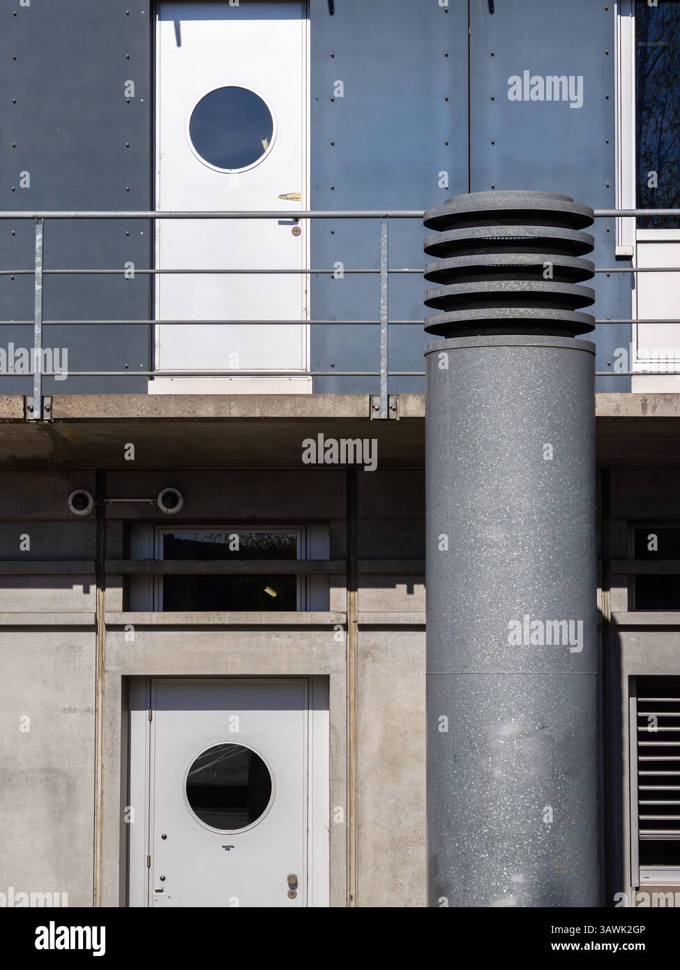Industrial building facade with different geometric shapes and a large ...