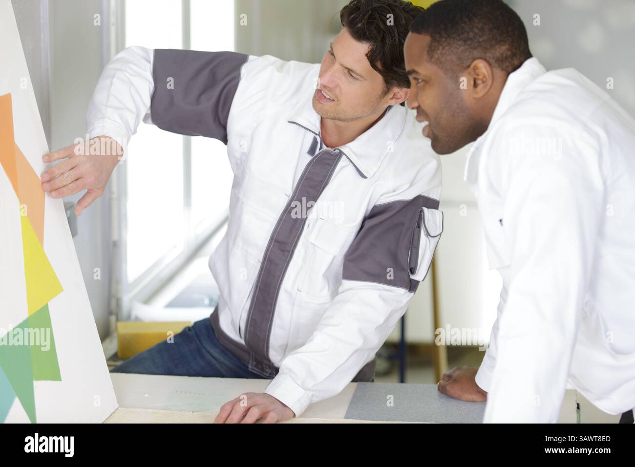 young apprentice painter in professional training Stock Photo