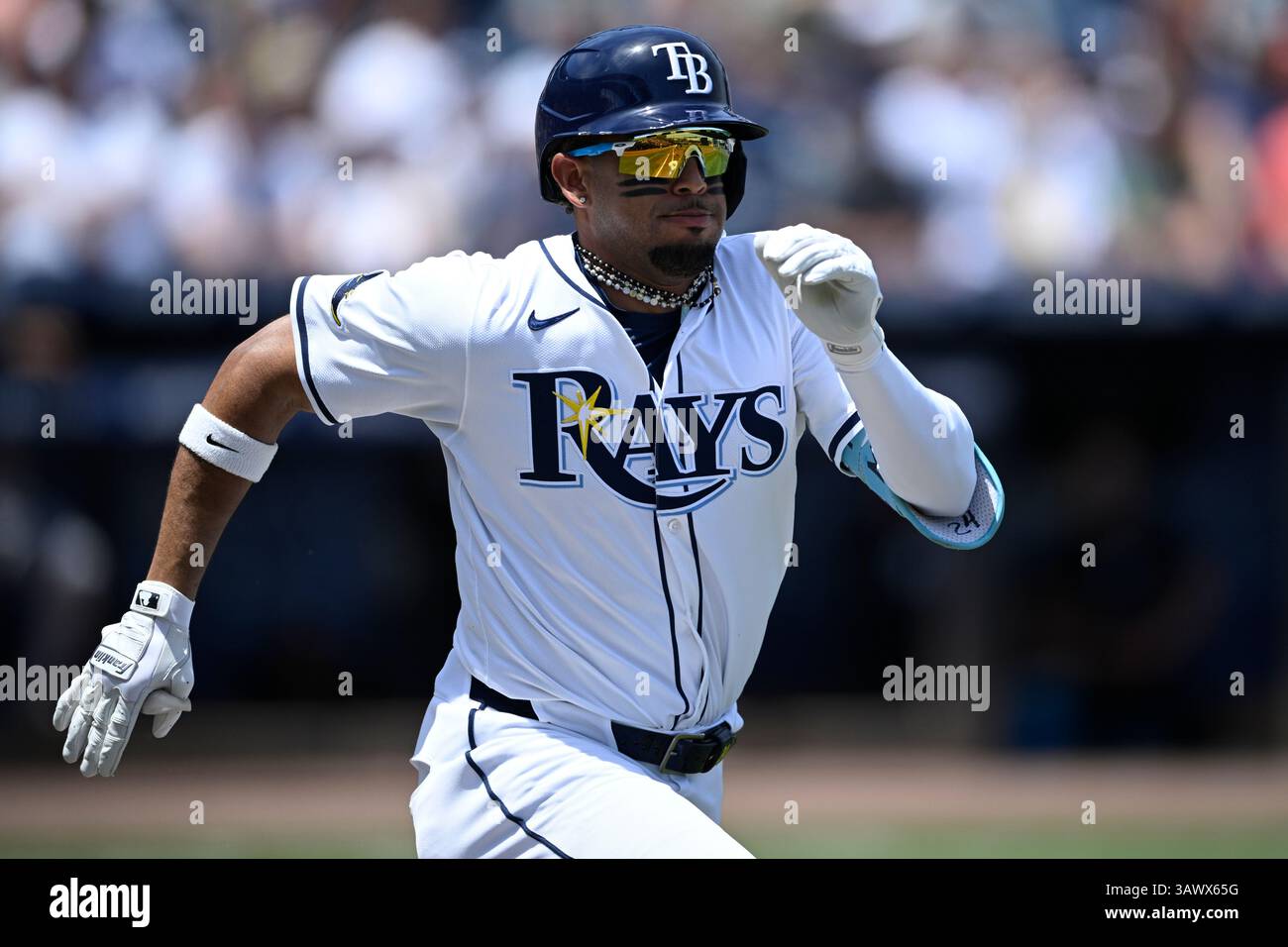 Tampa Bay Rays' Christopher Morel sprints to first base for a single as ...