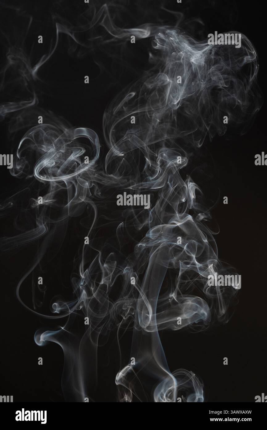 Smooth smoke cloud abstract on black background Stock Photo