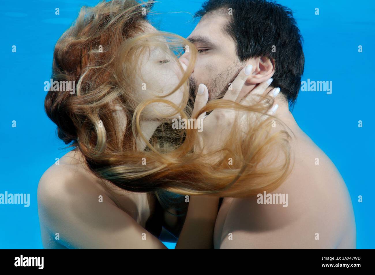 October 15, 2014 - Odessa, pool, Ukraine - Man and woman kissing under water, Underwater fasihon in the pool, Odessa, Ukraine (Credit Image: © Andrey Nekrasov/ZUMA Wire/ZUMAPRESS.com) Stock Photo