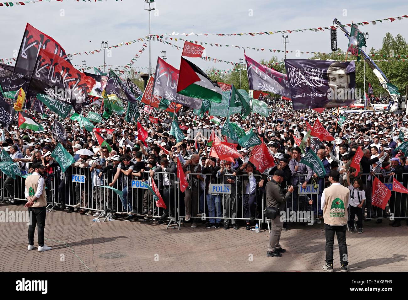 Palestinian and Islamic flags are seen carried by participants of the ...
