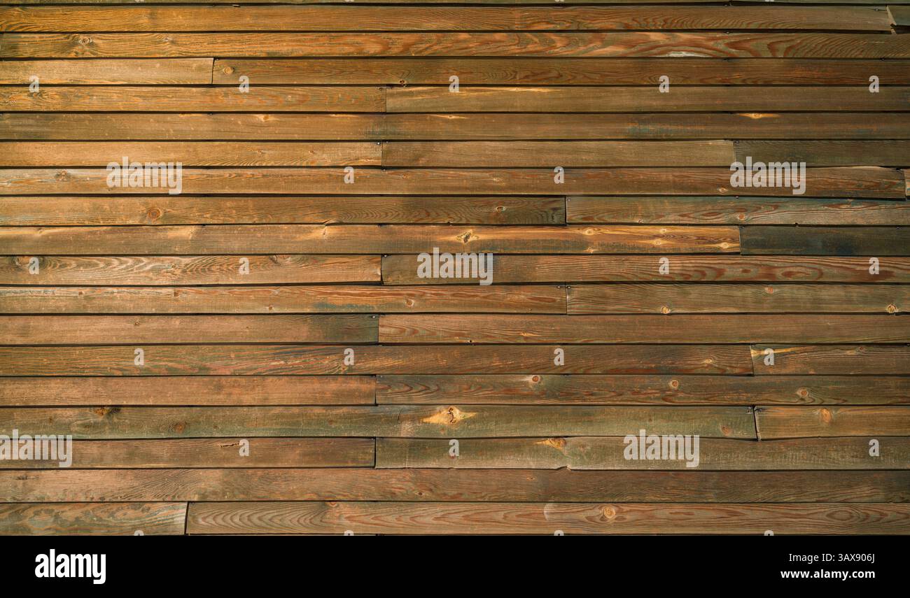Wooden wall cladding. Wooden wall texture. Brown wood timber surface Stock Photo
