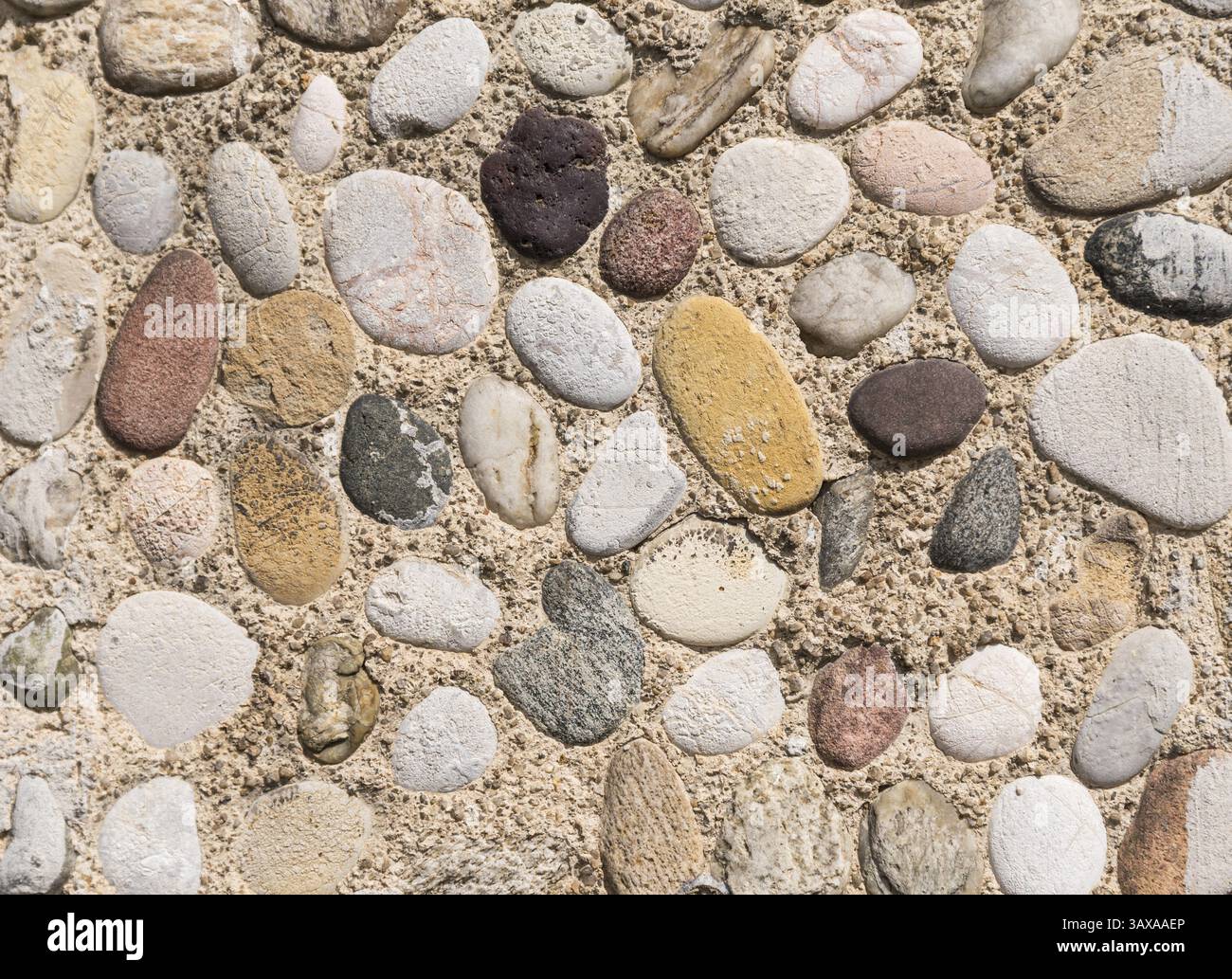 Coloured pebbles - background with a wall of coloured pebbles - mosaic ...