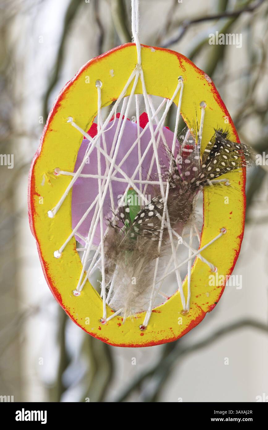 Creative and decorative homemade Easter egg - DIY Stock Photo