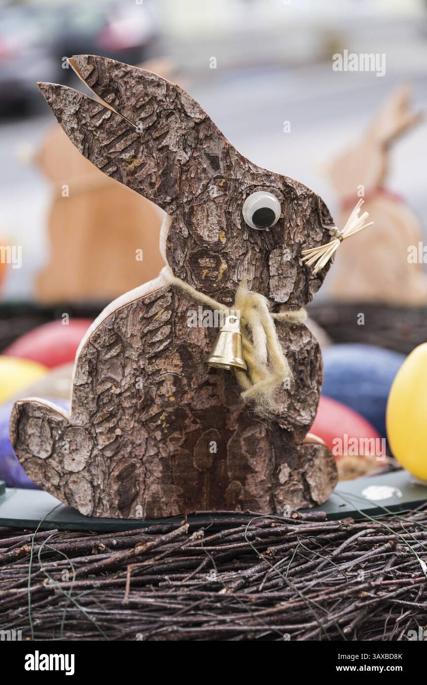 Creative Easter nest with wooden Easter bunny - homemade Easter decorations Stock Photo