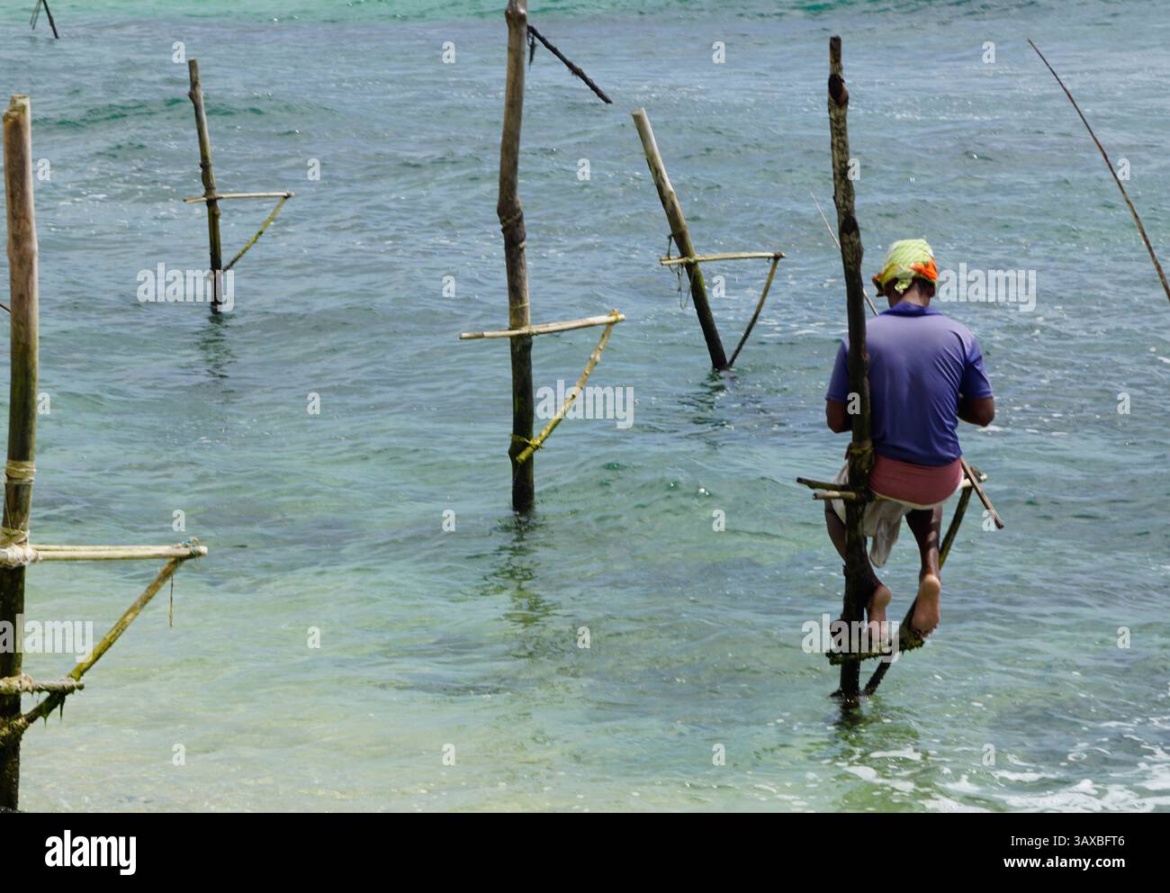 traditional stilt fisherman from sri lanka Stock Photo - Alamy