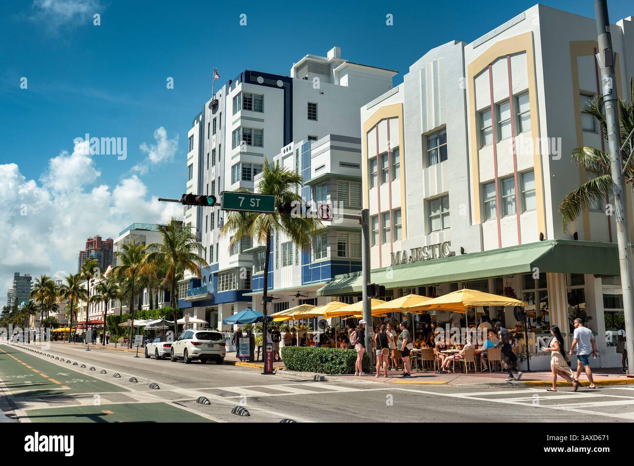 Miami Florida people walk by the Art Deco architecture on Ocean Drive Stock Photo