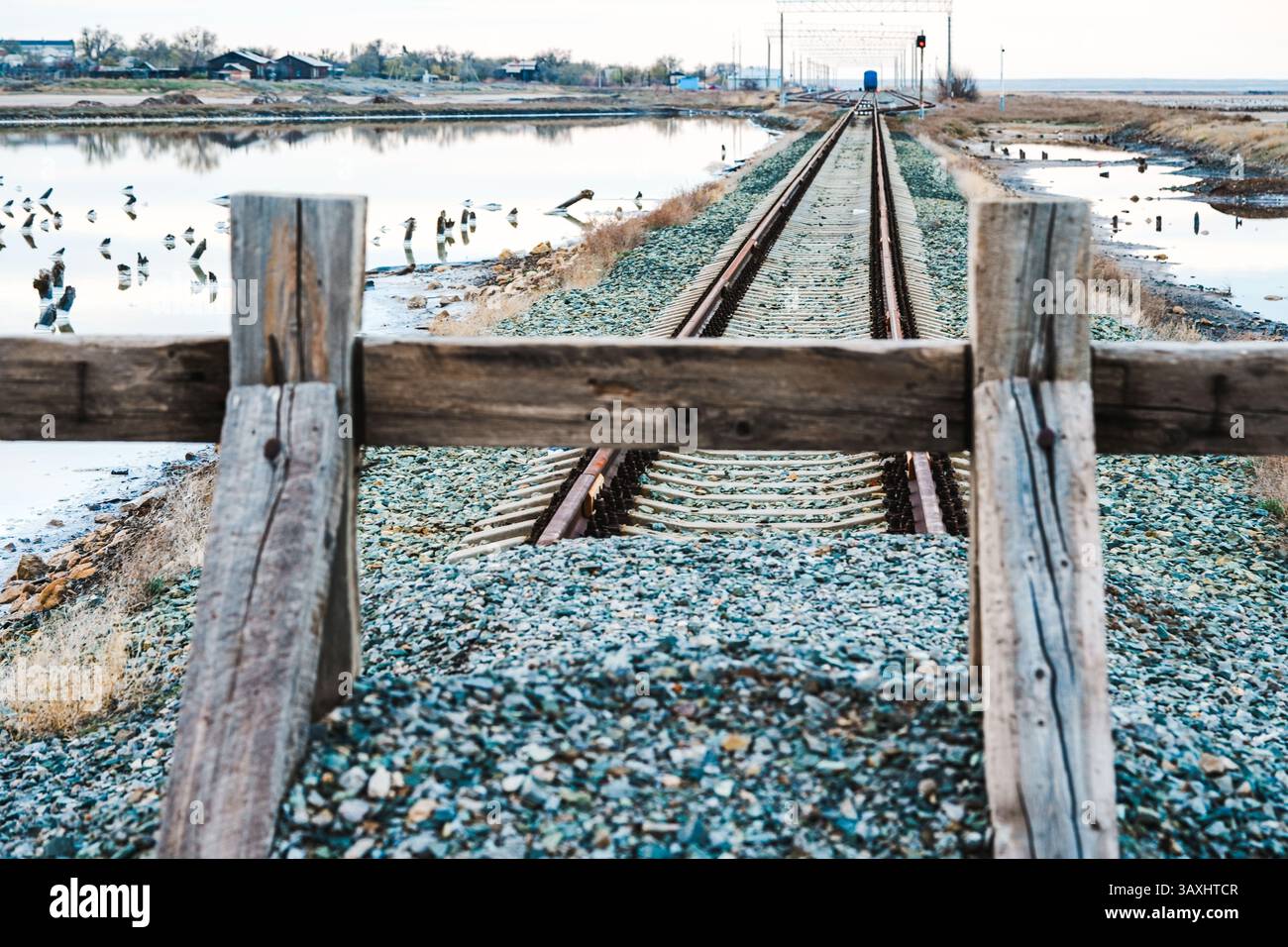 End of the road. The railway tracks are covered with gravel and covered ...