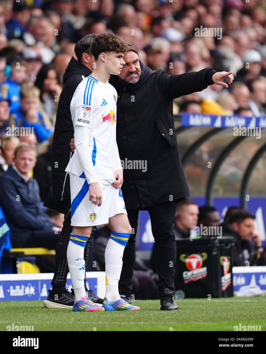 Harry Roper Leeds Leeds United's Harry Gray with manager Daniel Farke as he waits to be ...