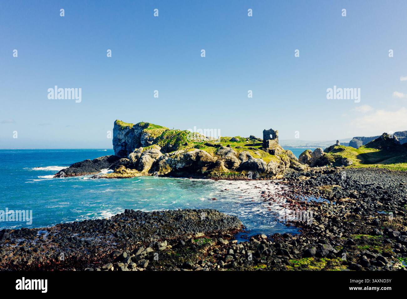 Aerial View Of Kinbane Castle Ruins On A Clear Sunny Day With Coastal 