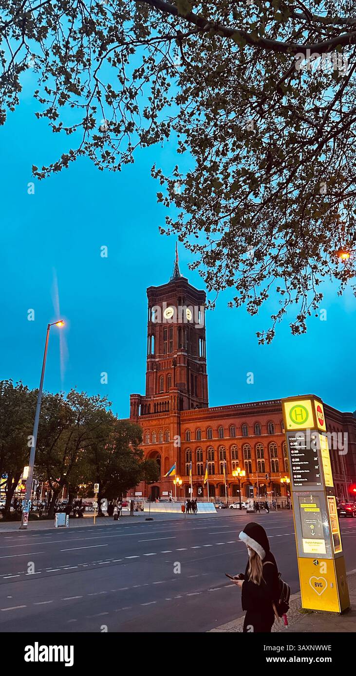 Berlin’s Rotes Rathaus glowing at blue hour - Smartphone Captured Stock Image