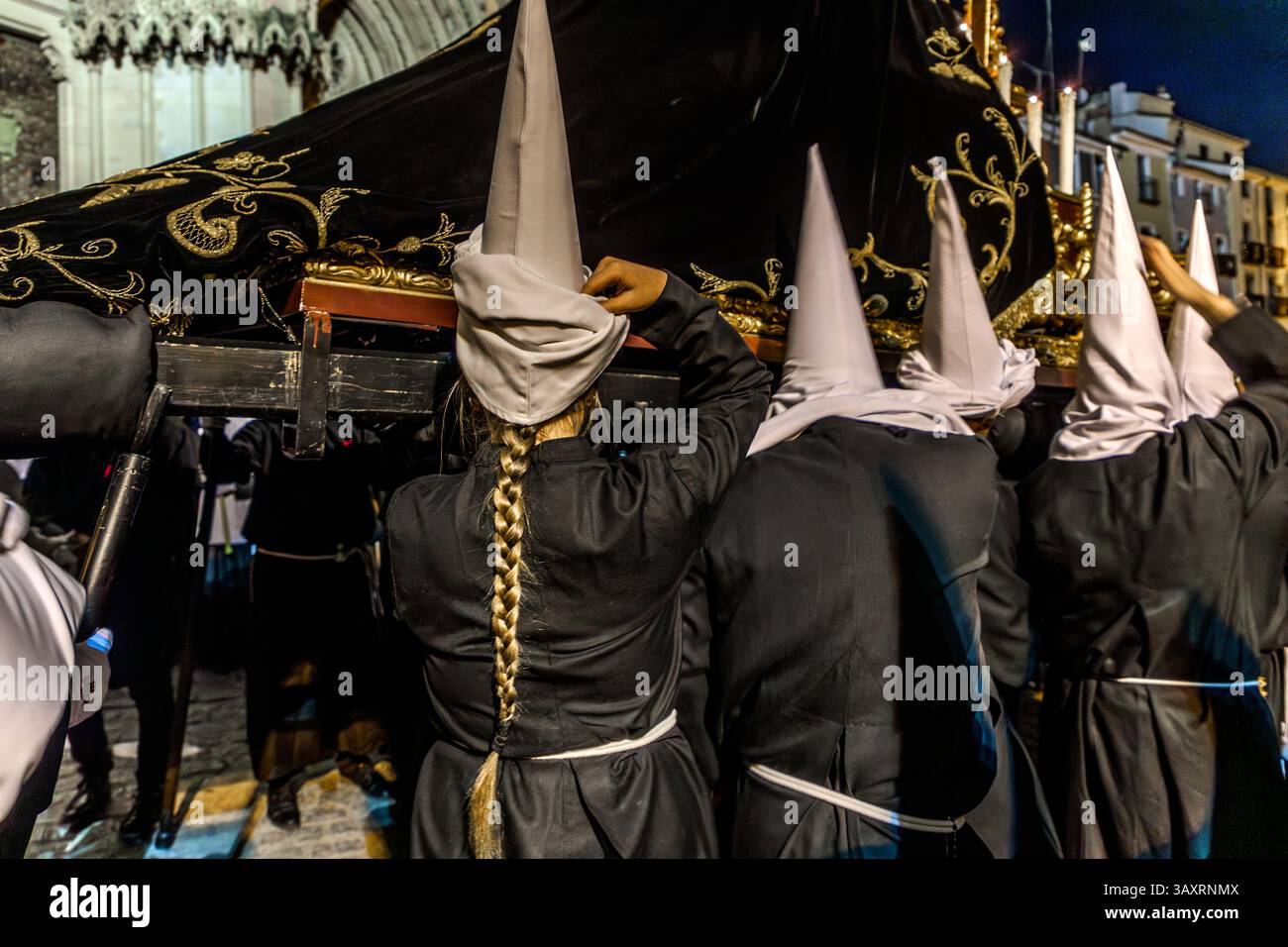 The evening Good Friday procession, which begins at 9 pm at Cuenca Cathedral, is characterised by special solemnity, silence and an impressive atmosphere. Calle San Pedro, Cuenca, Castilla-La Mancha, Spain Stock Photo