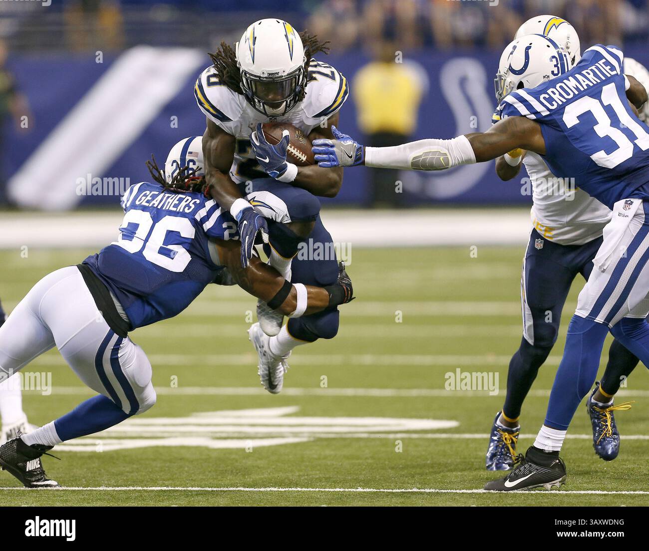 September 25, 2016 - Indianapolis, IN, USA - San Diego Chargers running back Melvin Gordon (28) tries to get more yards against Indianapolis Colts strong safety Clayton Geathers (26) in second half action at Lucas Oil Stadium Sunday, Sept. 25, 2016 in Indianapolis, Ind. The Colts won 26-22. (Credit Image: © Sam Riche/TNS via ZUMA Wire) Stock Photo