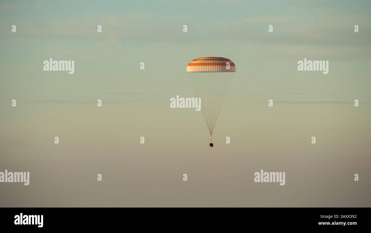 September 7, 2016 - Zhezkazgan, Kazakhstan - International Space Station crew from Expedition 48 floats back to Earth aboard the Russian Soyuz TMA-20M spacecraft to a remote landing area September 7, 2016 near Zhezkazgan, Kazakhstan.  Onboard the spacecraft are American astronaut Jeff Williams, and Russian cosmonauts Alexey Ovchinin, and Oleg Skripochk returning from 172 days in space. (Credit Image: © NASA/ZUMAPRESS.com) Stock Photo