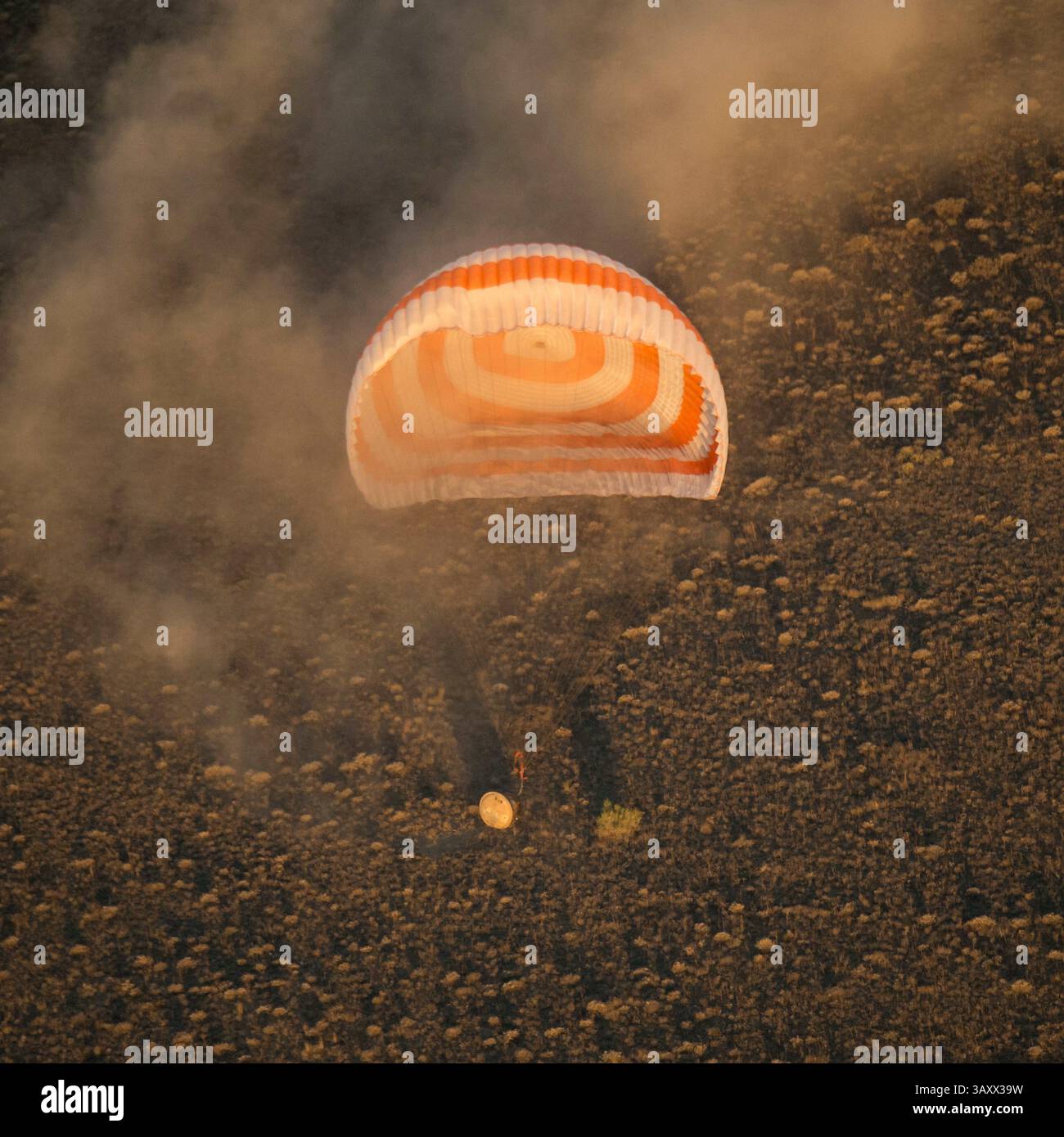 September 7, 2016 - Zhezkazgan, Kazakhstan - International Space Station crew from Expedition 48 touches down aboard the Russian Soyuz TMA-20M spacecraft to a remote landing area September 7, 2016 near Zhezkazgan, Kazakhstan.  Onboard the spacecraft are American astronaut Jeff Williams, and Russian cosmonauts Alexey Ovchinin, and Oleg Skripochk returning from 172 days in space. (Credit Image: © NASA/ZUMAPRESS.com) Stock Photo