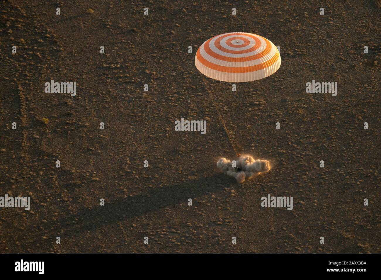 September 7, 2016 - Zhezkazgan, Kazakhstan - International Space Station crew from Expedition 48 touches down aboard the Russian Soyuz TMA-20M spacecraft to a remote landing area September 7, 2016 near Zhezkazgan, Kazakhstan.  Onboard the spacecraft are American astronaut Jeff Williams, and Russian cosmonauts Alexey Ovchinin, and Oleg Skripochk returning from 172 days in space. (Credit Image: © NASA/ZUMAPRESS.com) Stock Photo