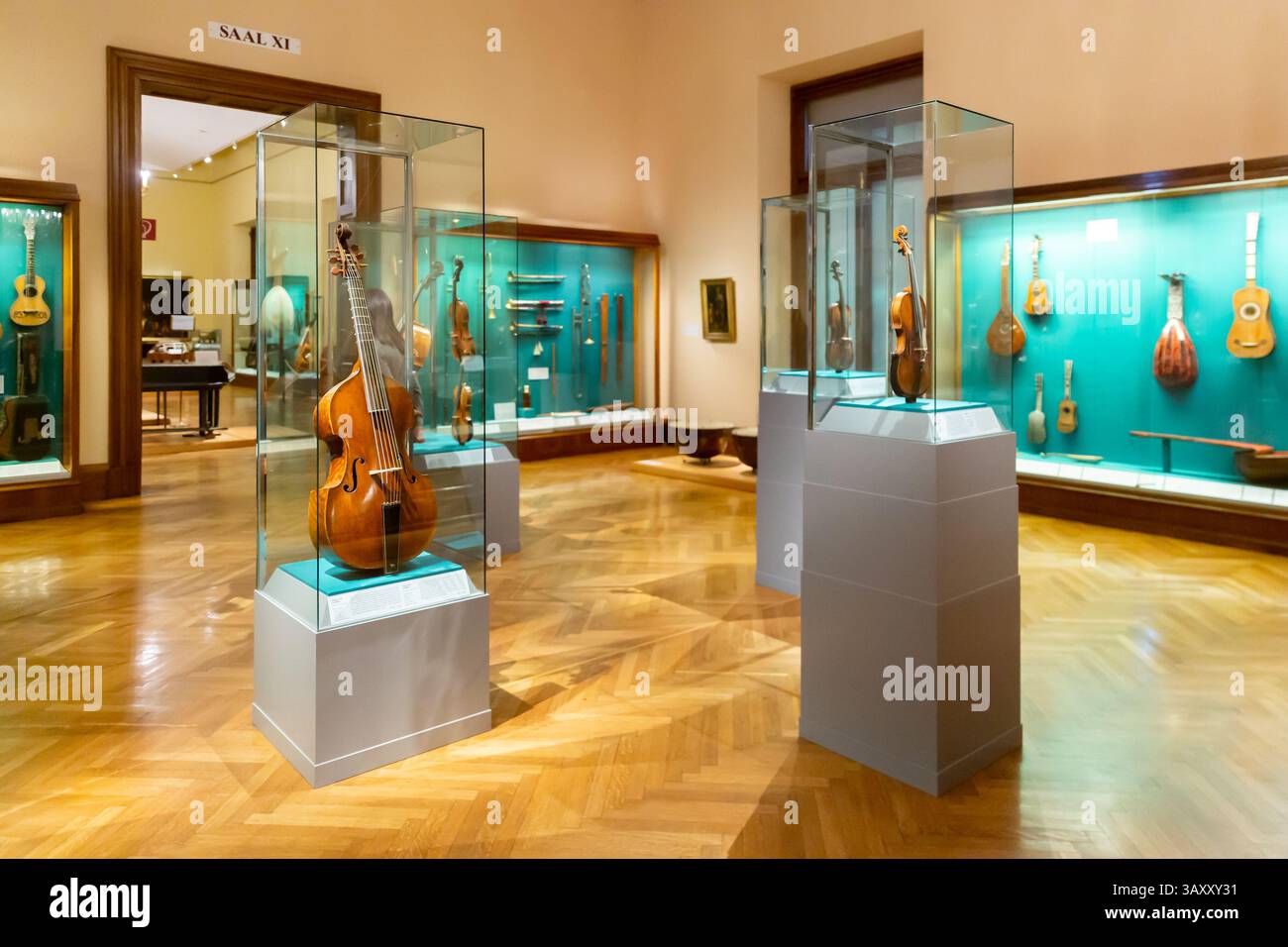 Austrian Stringed Instrument Showcases with bowed string instruments in Weltmuseum Wien, Austria ...