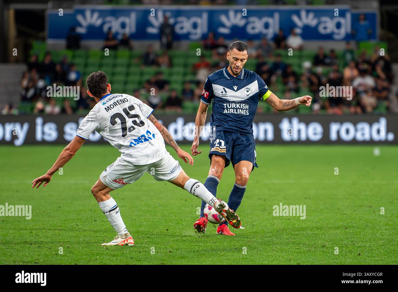 Melbourne Victory's Captain Roderick Miranda (R) and Auckland FC's ...