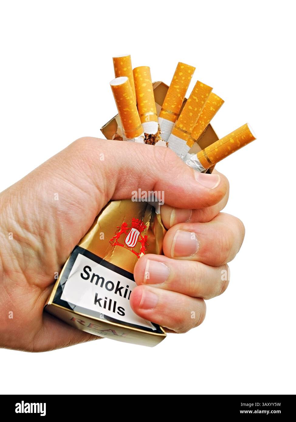Hand crushing a packet of cigarettes, cut out Stock Photo