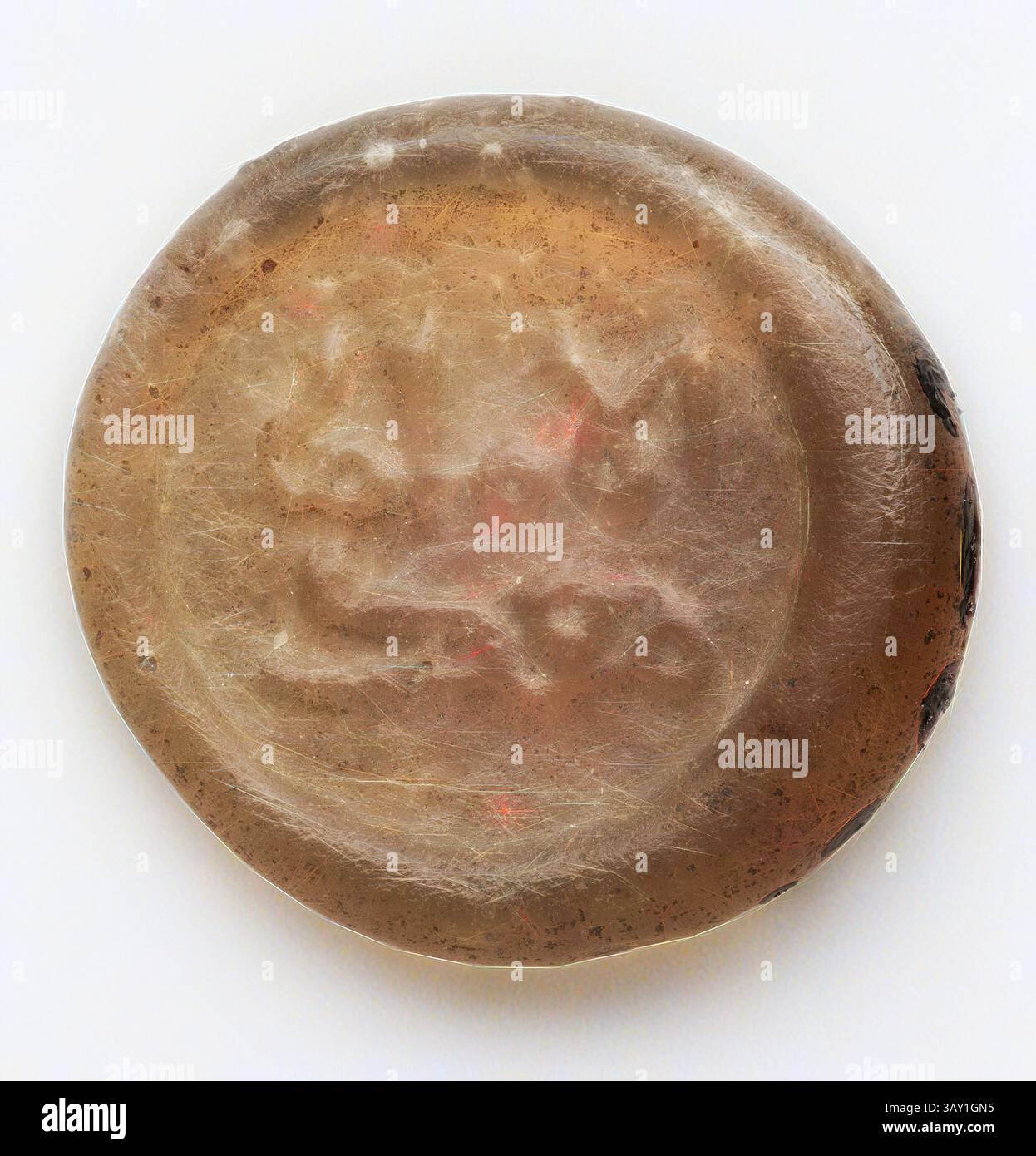 An oval-shaped seal featuring an engraved design, characterized by its smooth surface and subtle translucence. The intricate patterns suggest cultural or historical significance, likely used for imprinting on materials., Islamic, Egyptian, Quarter Dirham Coin Weight from the Reign of the Fatimid Caliph al-Mustansir, 1036/1094, Glass, 1/8 x 9/16 in. diam. ( .32 x 1.42 cm), Classic art with a modern twist reimagined by Artotop Stock Photo