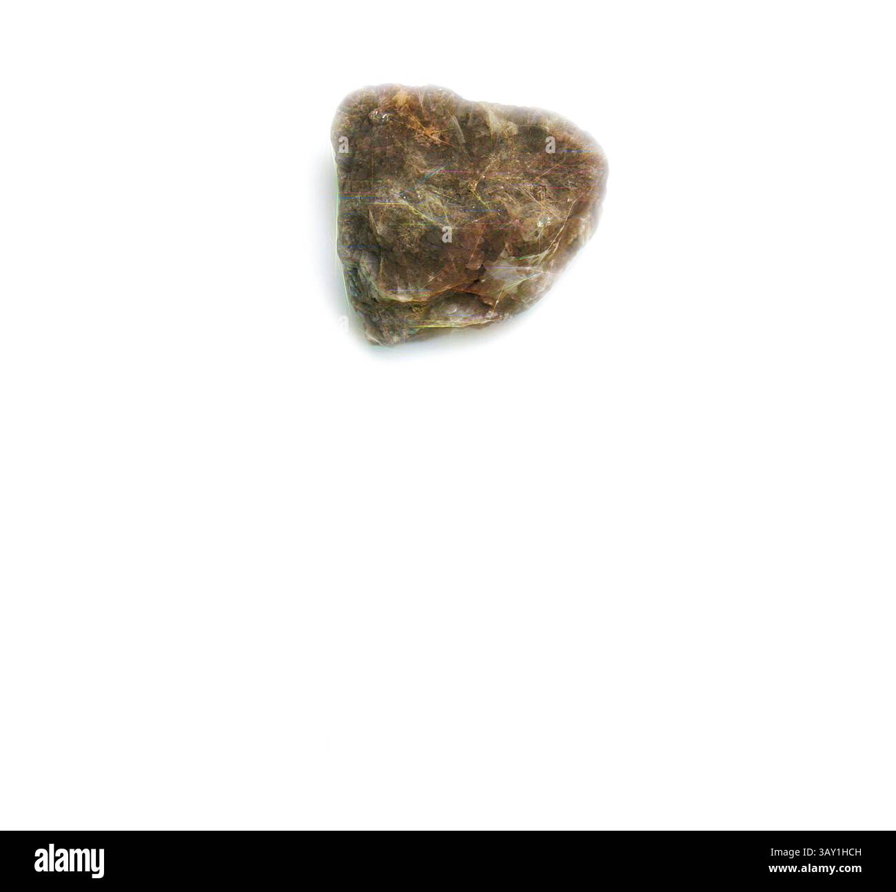 A rough, unpolished stone with a mix of earthy hues and textures sits ...