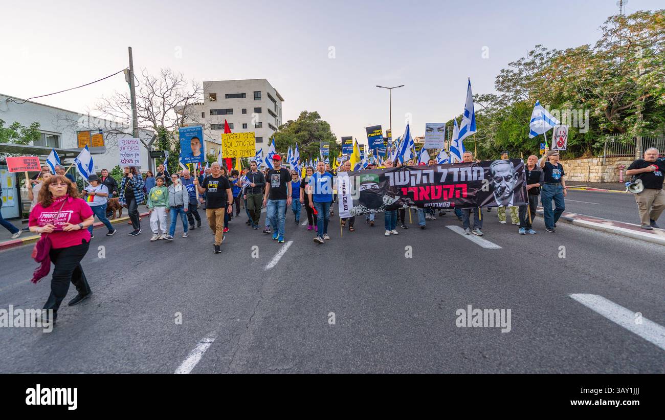 Haifa, Israel - April 19, 2025: People with various signs and flags ...