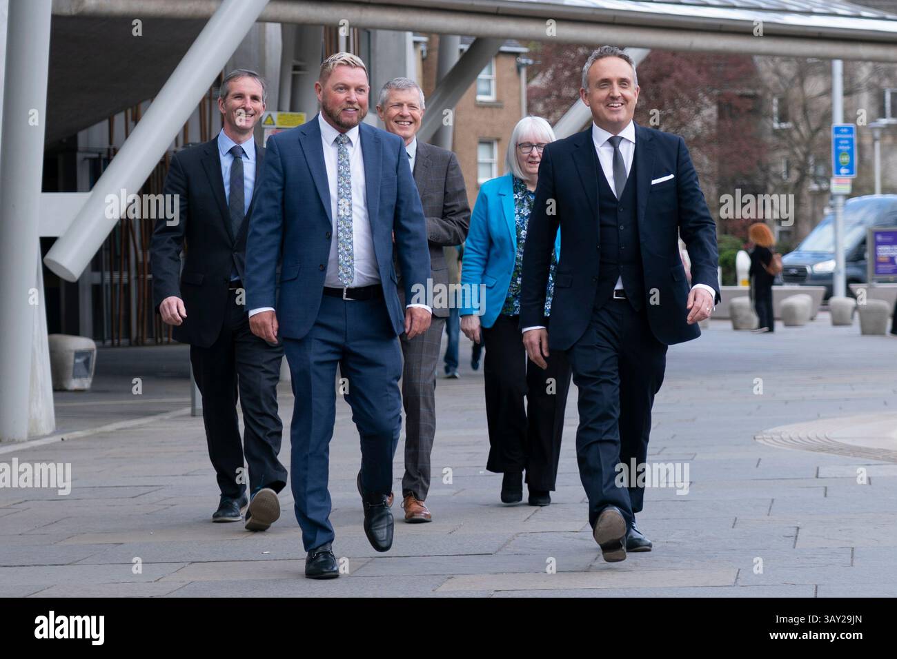 Edinburgh, Scotland UK. 22nd  April 2025. Alex Cole Hamilton MSP  introduces new recruit to the Scottish Liberal Democrats, Jamie Greene MSP , outside the Scottish Parliament today. Mr Greens defected from the Scottish Conservatives whom he described as moving to the far-right. Iain Masterton/Alamy Live News Stock Photo