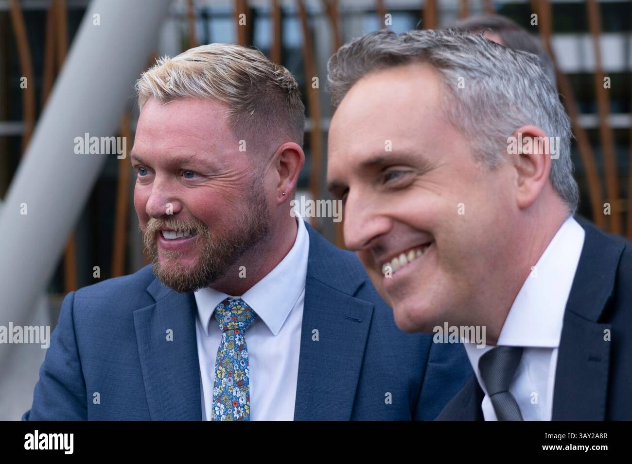 Edinburgh, Scotland UK. 22nd  April 2025. Alex Cole Hamilton MSP  introduces new recruit to the Scottish Liberal Democrats, Jamie Greene MSP , outside the Scottish Parliament today. Mr Greens defected from the Scottish Conservatives whom he described as moving to the far-right. Iain Masterton/Alamy Live News Stock Photo