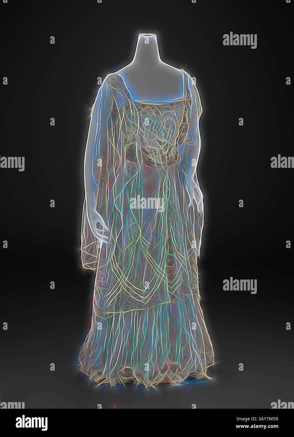 A delicate gown is presented, ethereal in appearance, with flowing ...