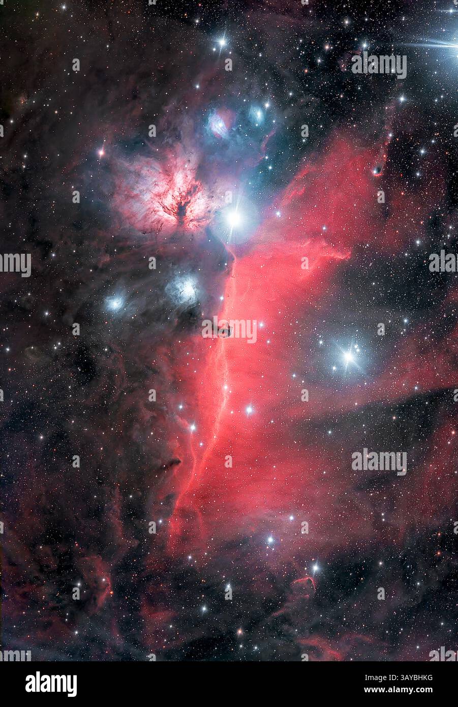 Flame nebula, the emission nebula IC434 and the dark Horsehead Nebula just south of the bright star Alnitak in constellation Orion. Stock Photo