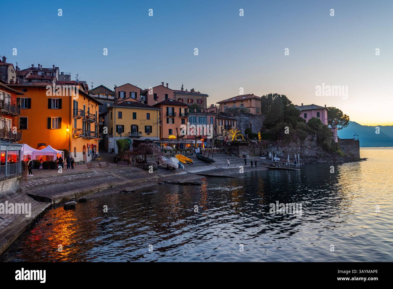 Sunset view of Varenna town situated at lake Como in Italy.IMAGE Stock Photo